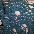 Kundbild DROPS Snow Uni Colour garn - 50g - Turkos (05): Lätt dock smidigt garn att virka...
