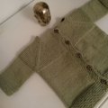 Kundbild DROPS Merino Extra Fine Uni Colour garn - 50g - Pistage (26): Babykofta