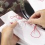 Broderisett juleservietter juler�d 4-pakning